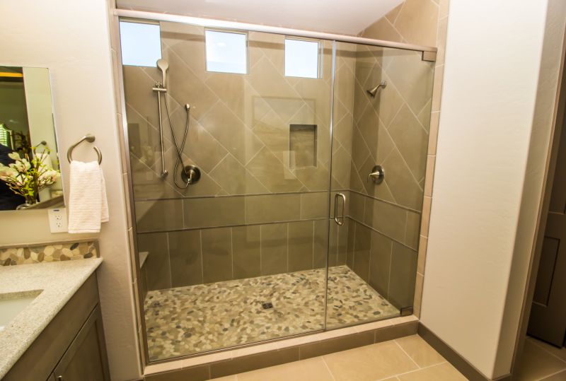 Elegant walk-in shower with glass enclosure